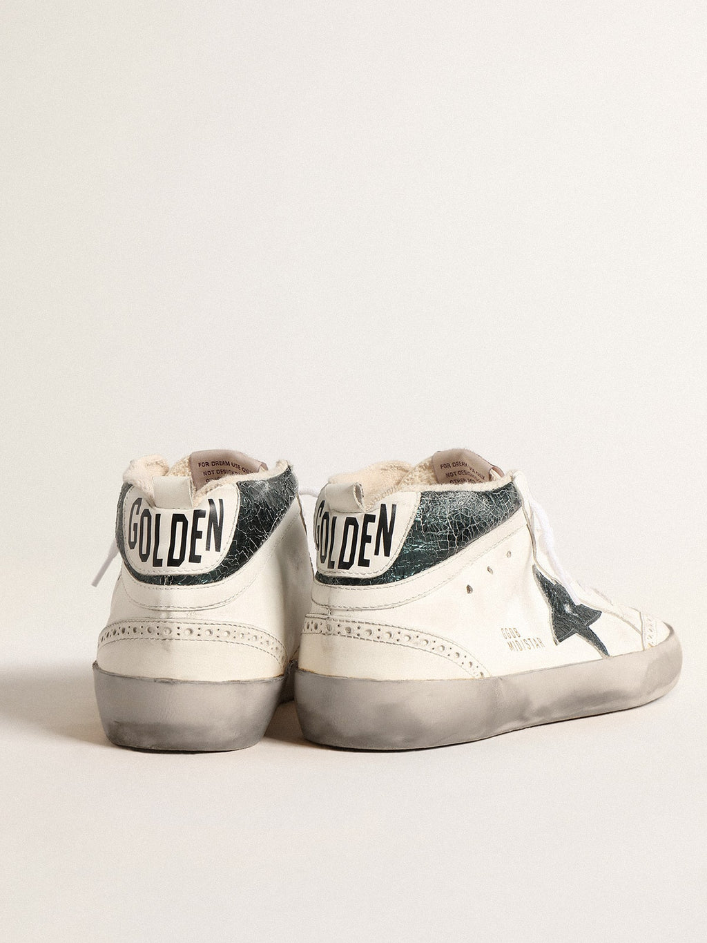 Mid Star with green metallic leather star and white flash