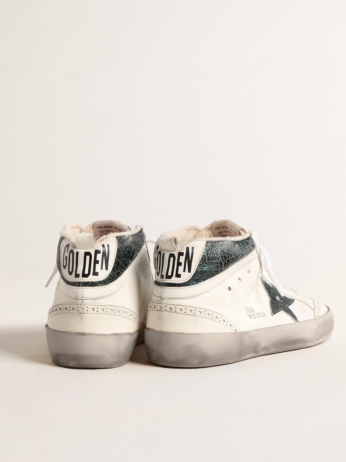 Mid Star with green metallic leather star and white flash