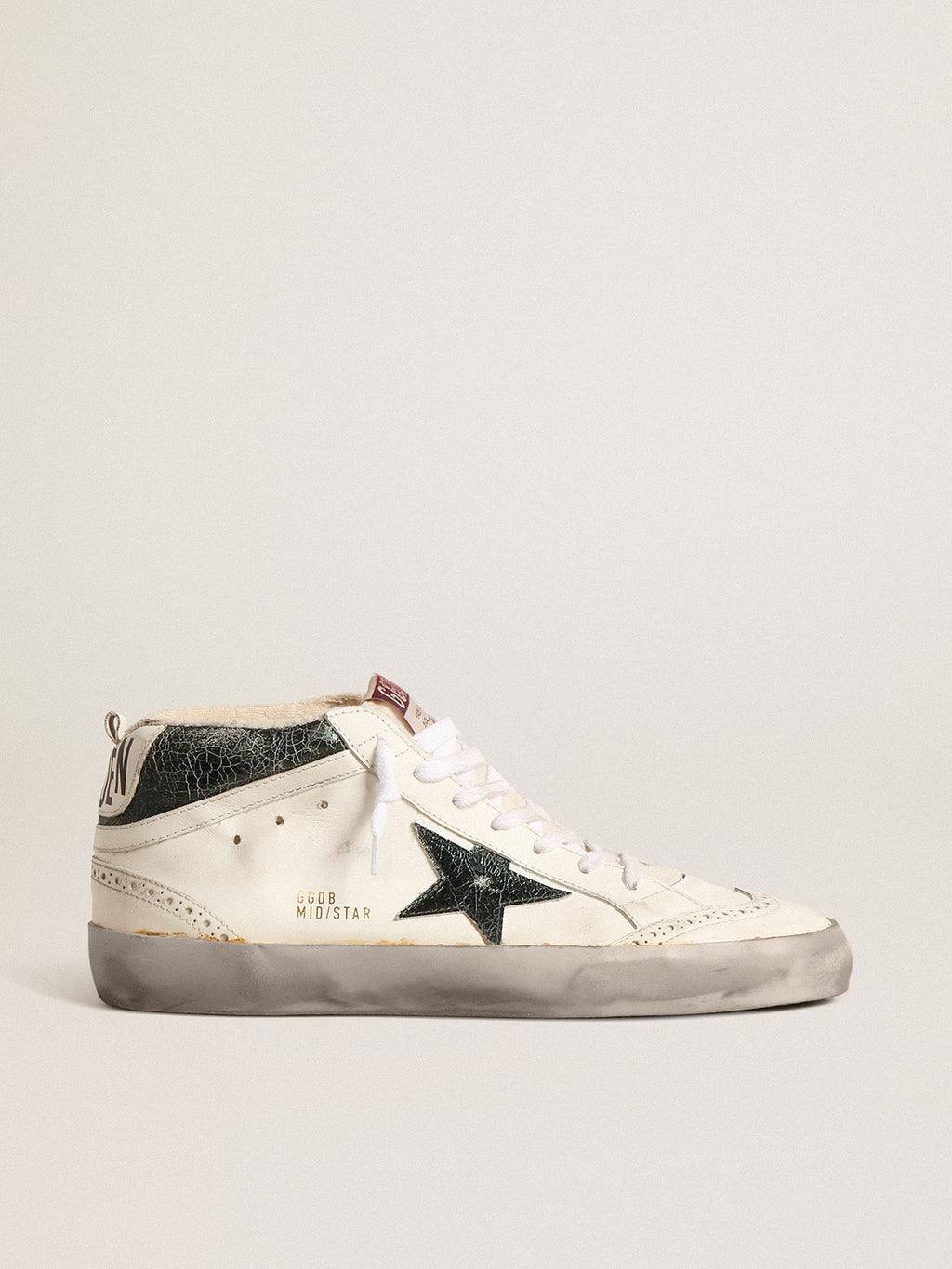 Mid Star with green metallic leather star and white flash