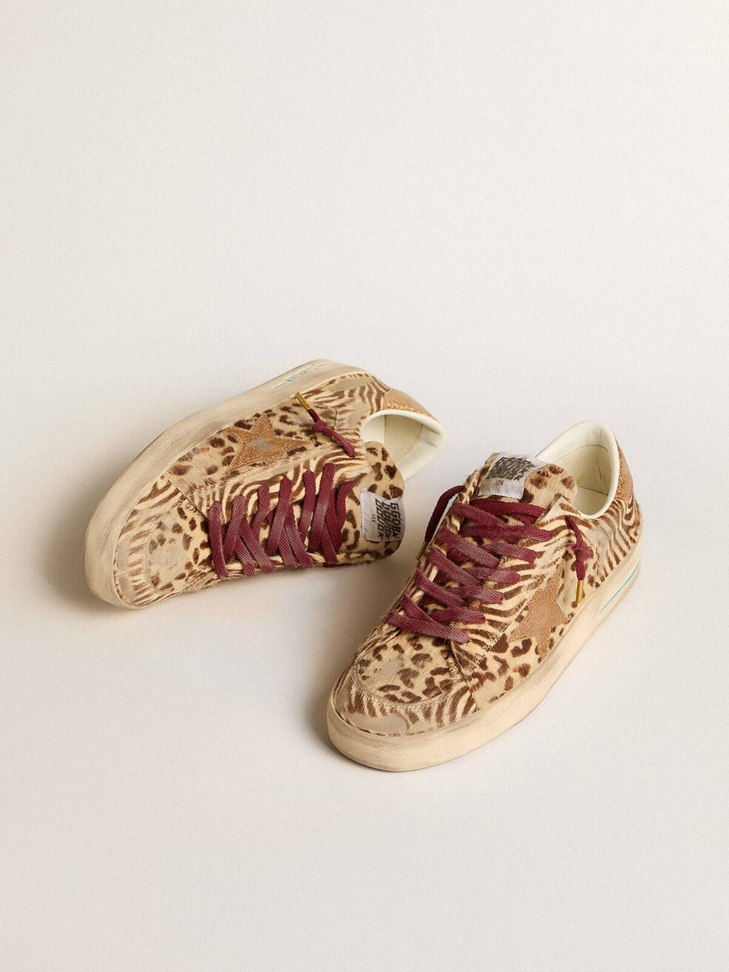 Men's Stardan LTD in animal-print pony skin with gold glitter star