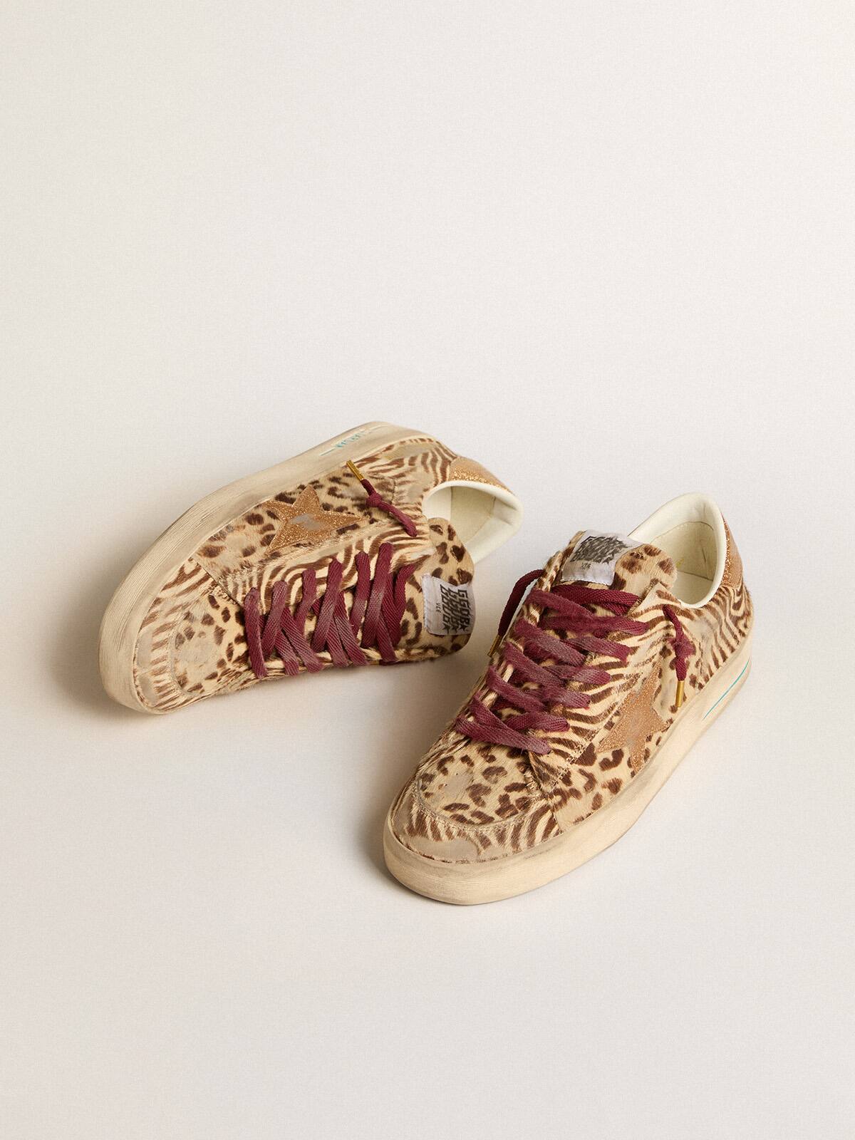 Men's Stardan LTD in animal-print pony skin with gold glitter star