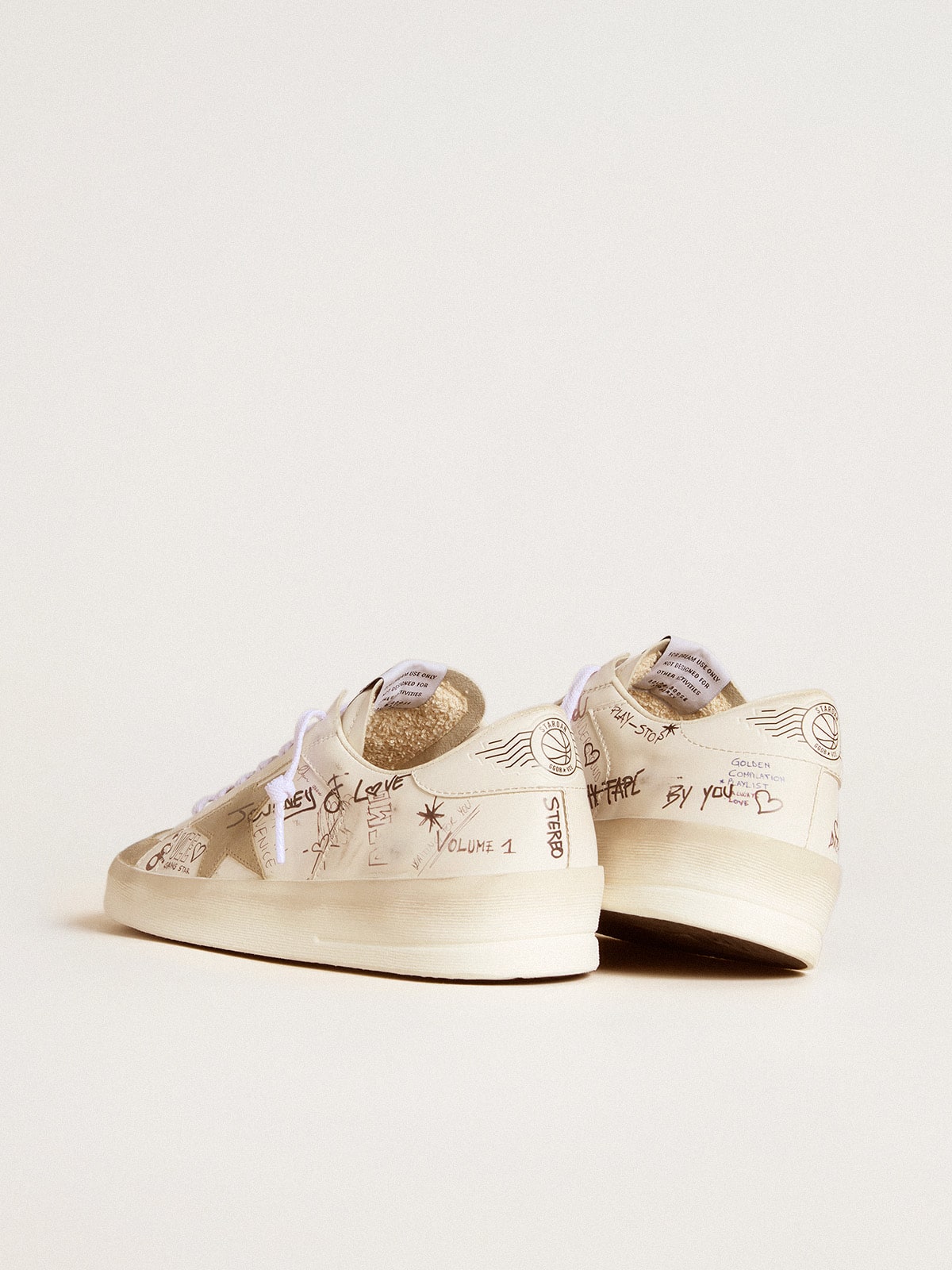 Stardan in leather with all-over lettering and ice-gray suede star