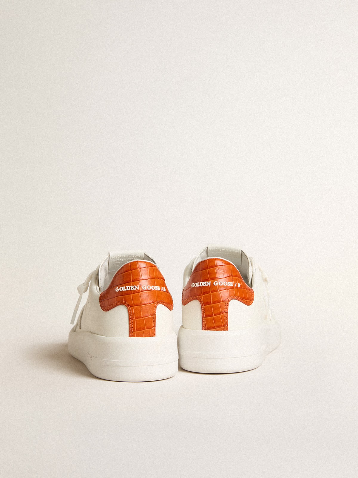 Men's Purestar with white leather star and orange heel tab
