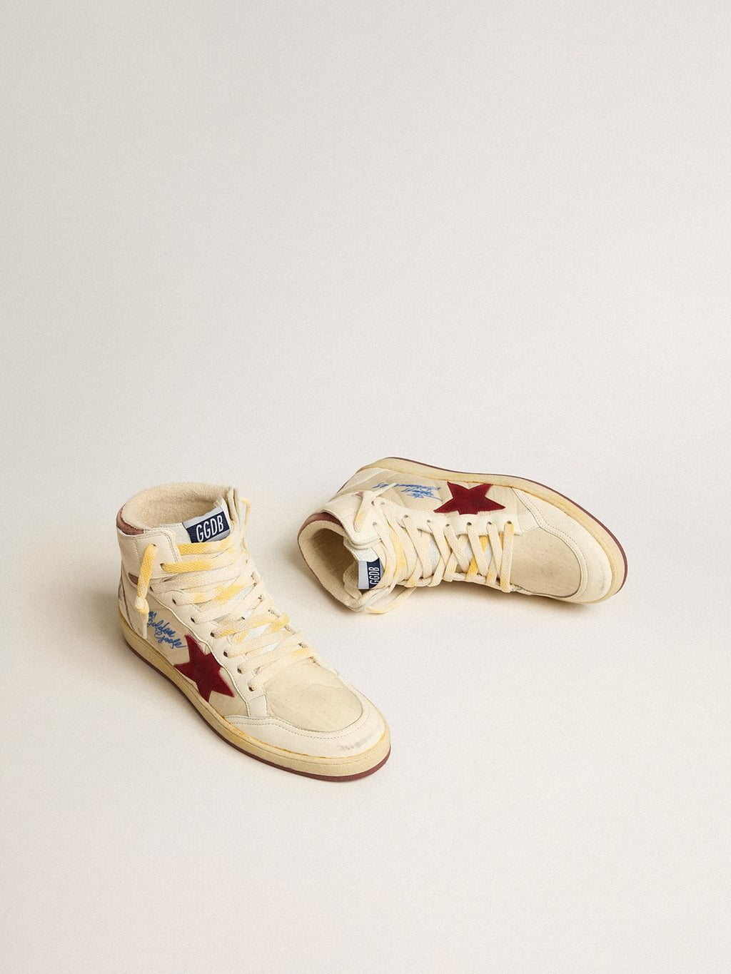 Sky-Star in beige nylon and nappa with pomegranate suede star