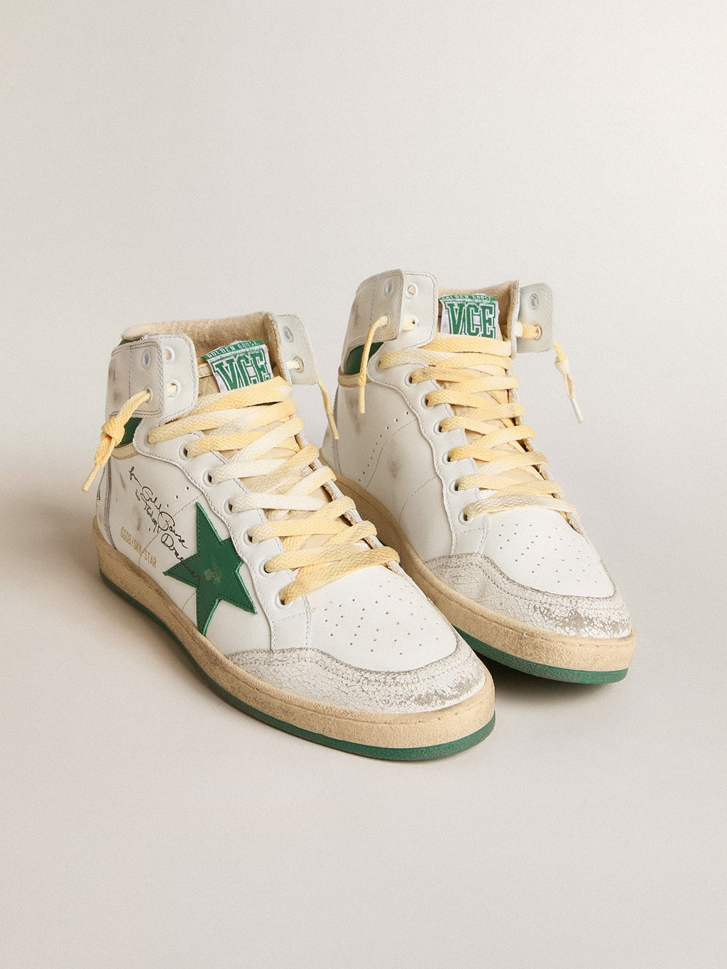 Sky-Star in white leather with green leather star