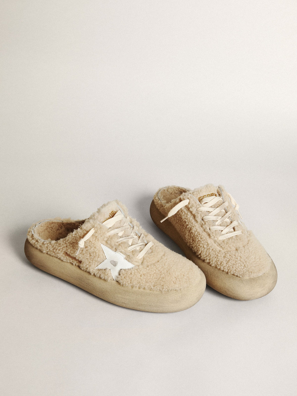 Men’s Space-Star Sabots in beige shearling with white leather star
