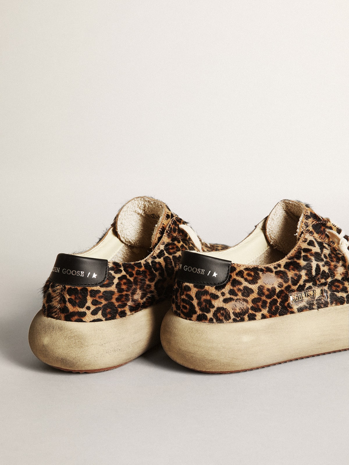 Men's Space-Star in leopard print pony skin with black star and heel