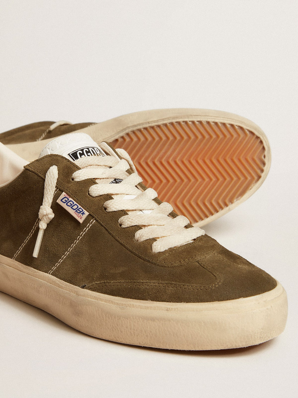 Soul Star in green suede with white leather heel tab and tongue
