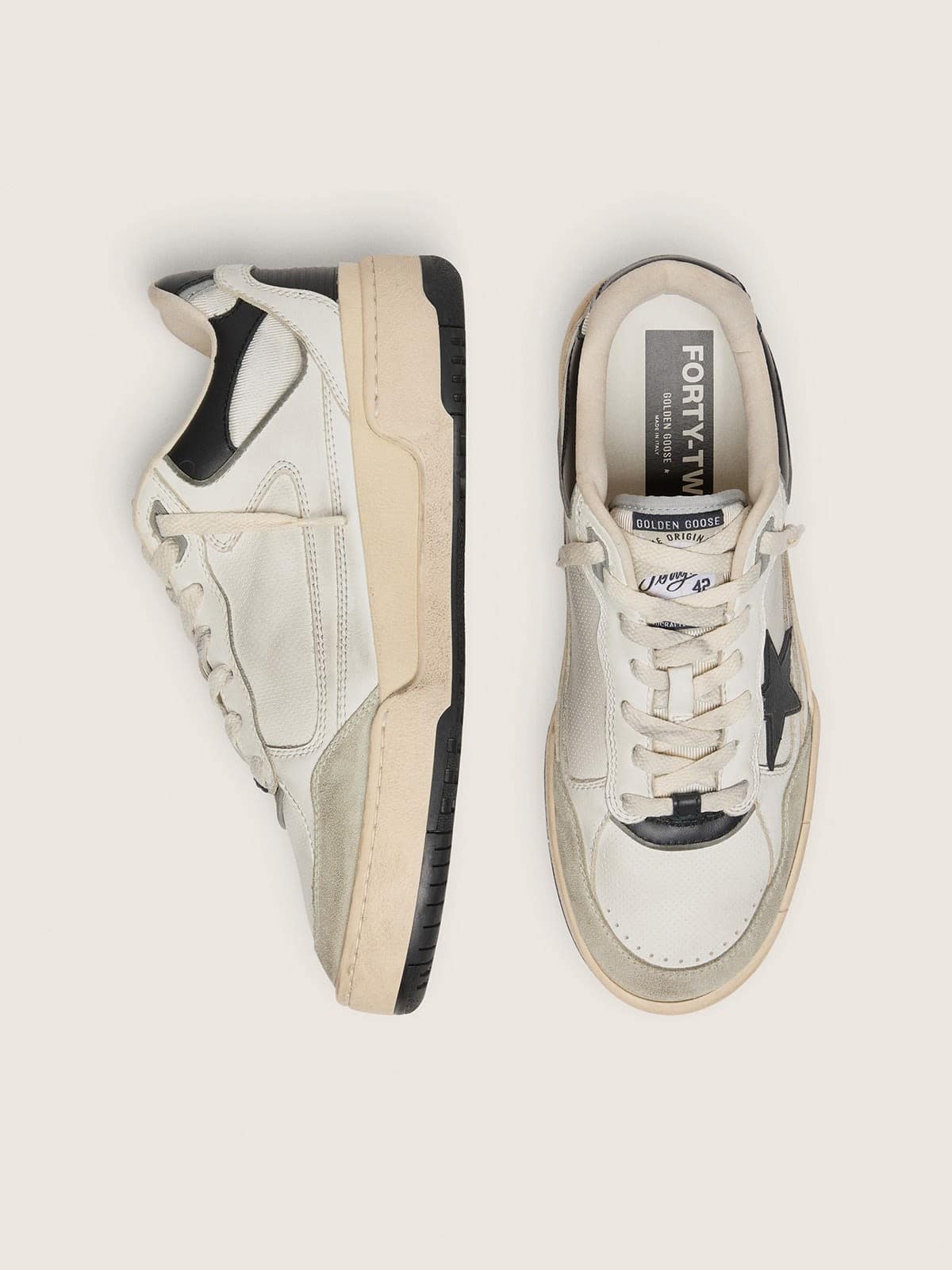 Men’s Forty2 with black star and black leather heel tab