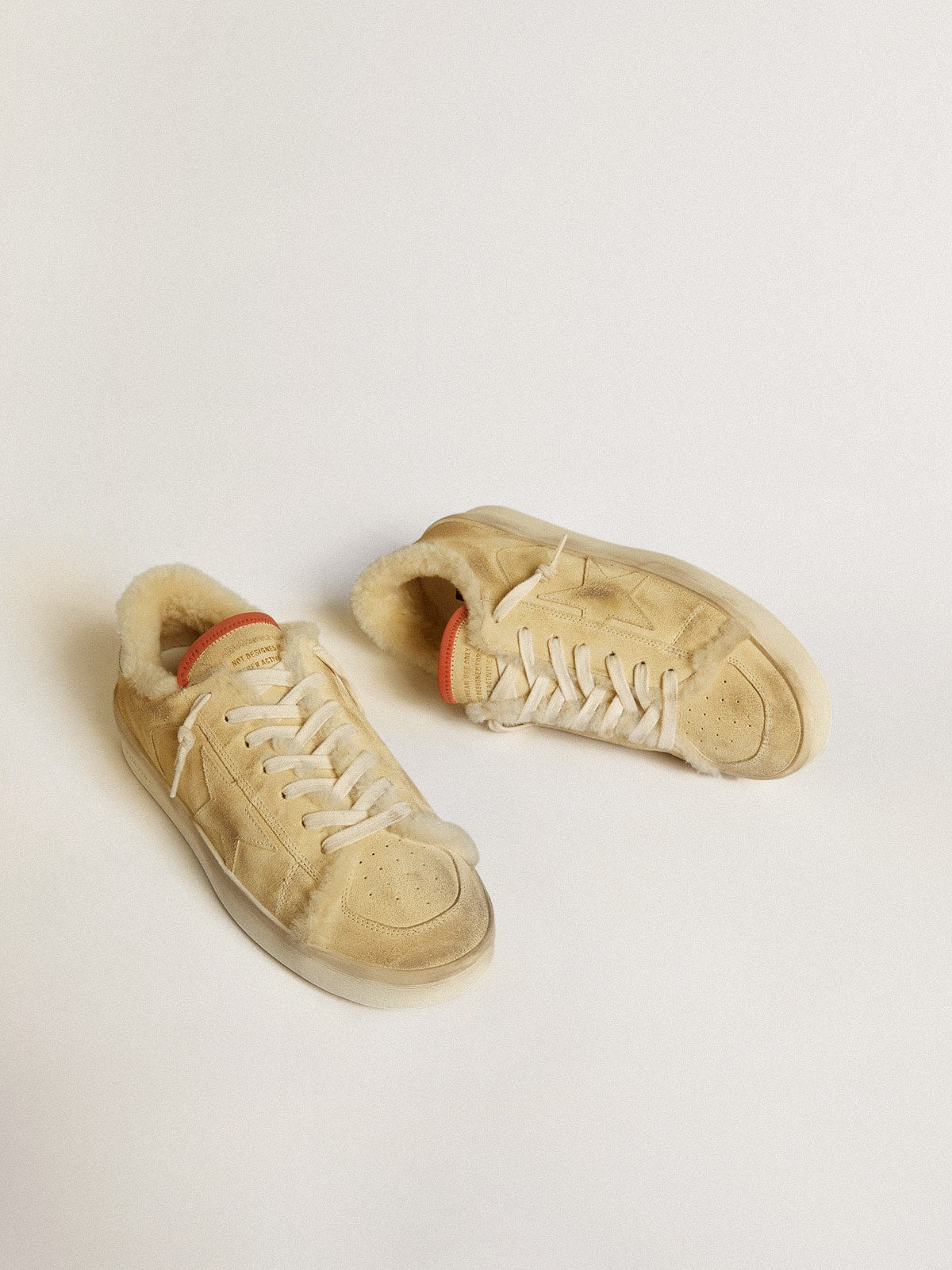 Stardan in beige suede with leather heel tab and shearling lining