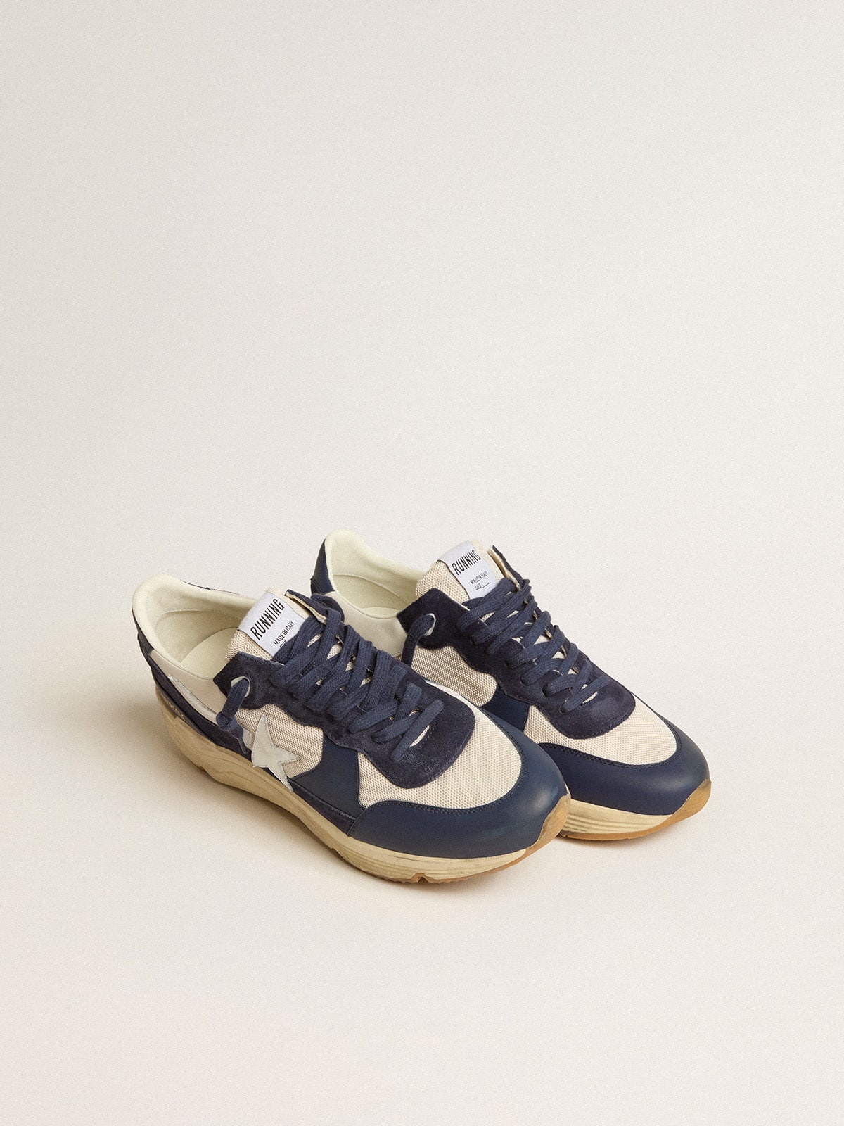Running Sole in cream mesh and blue leather with a white leather star