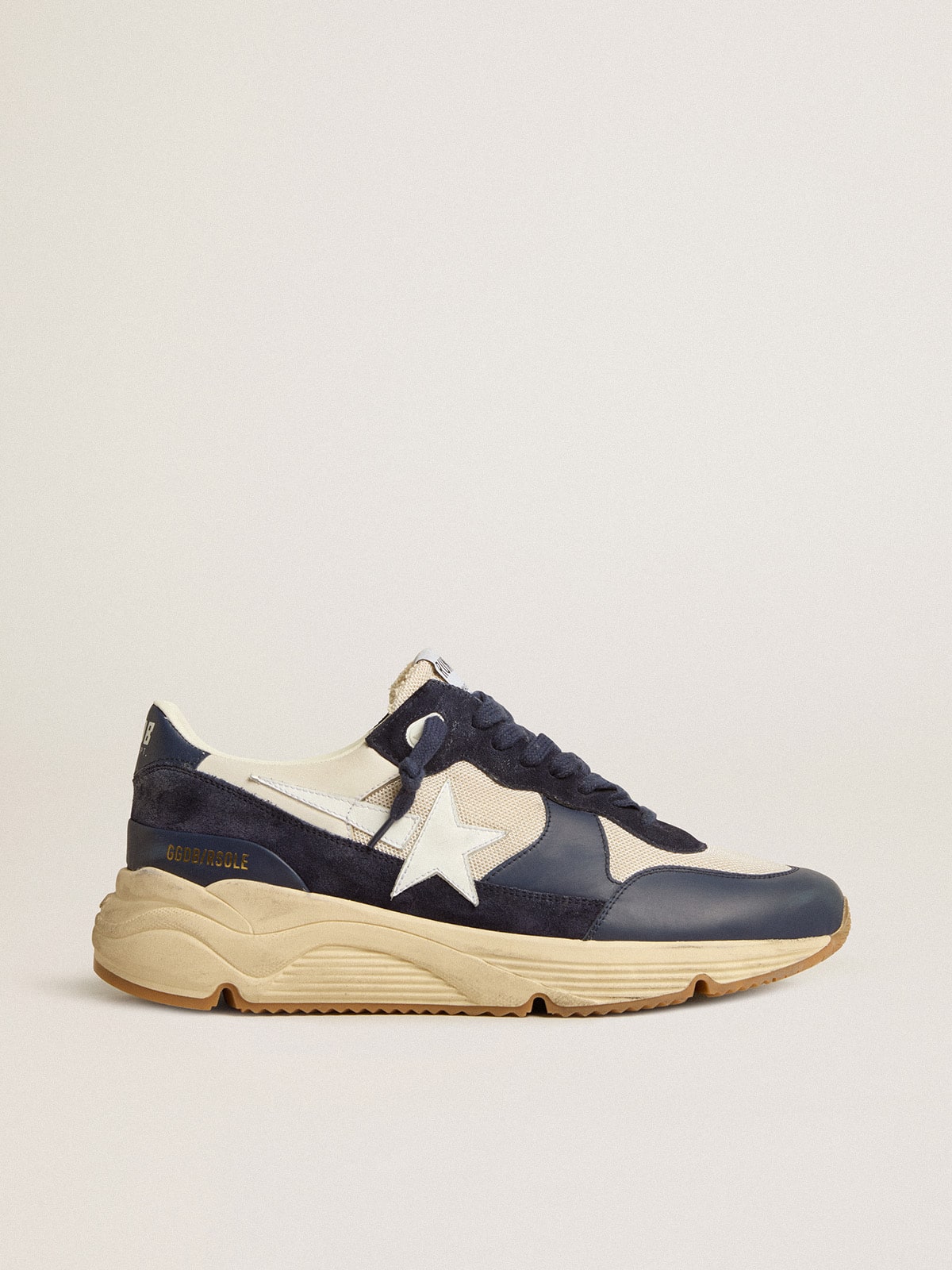 Running Sole in cream mesh and blue leather with a white leather star