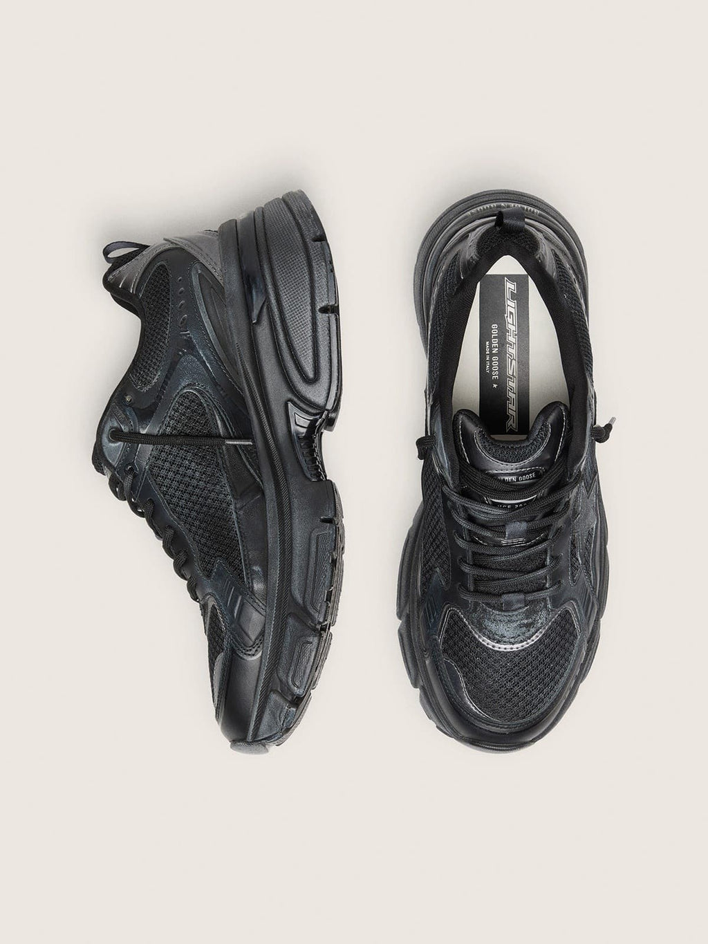 Men’s Lightstar with black leather and mesh upper and black star