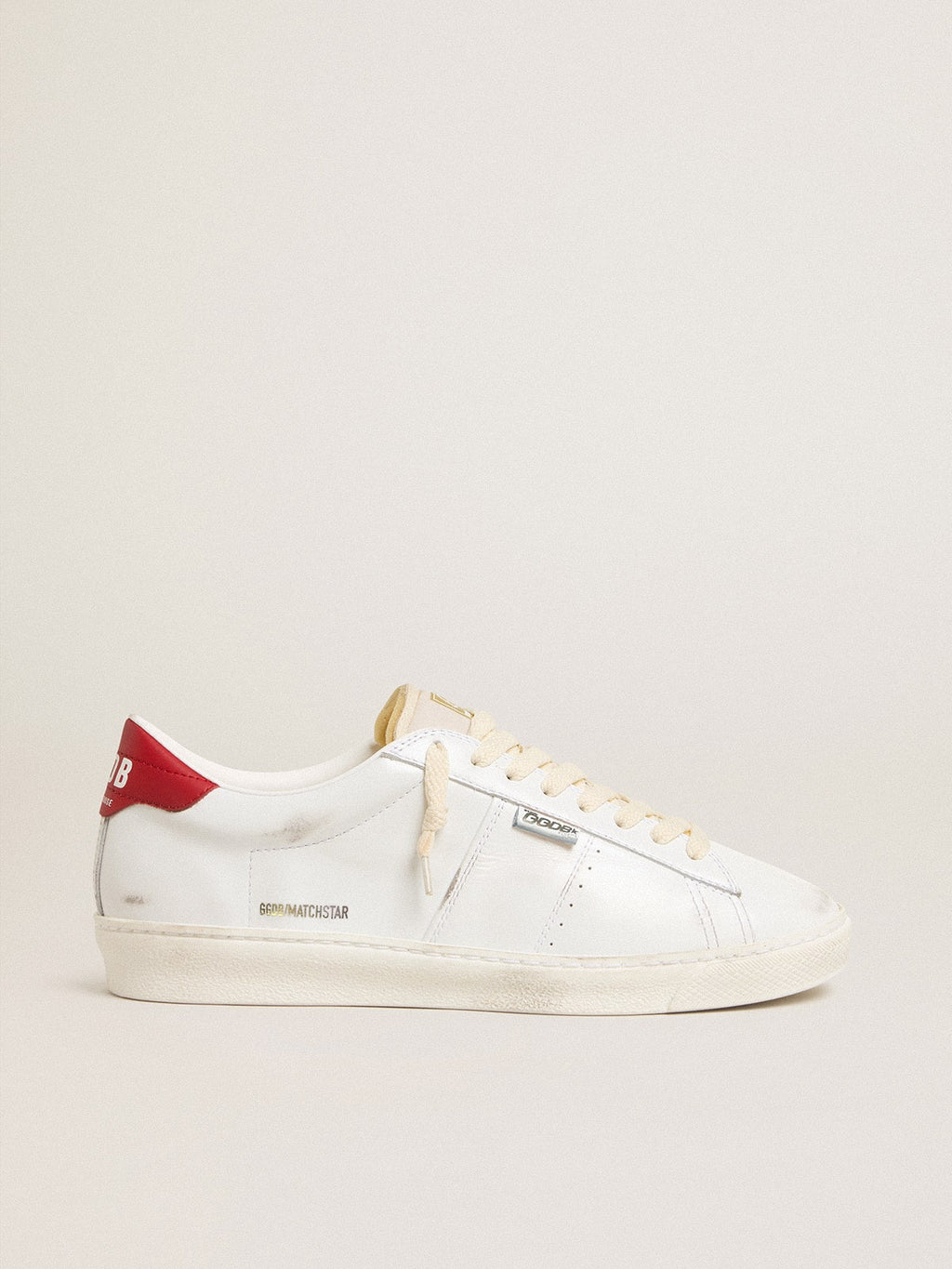 Matchstar in glossy white leather with glossy red leather heel tab