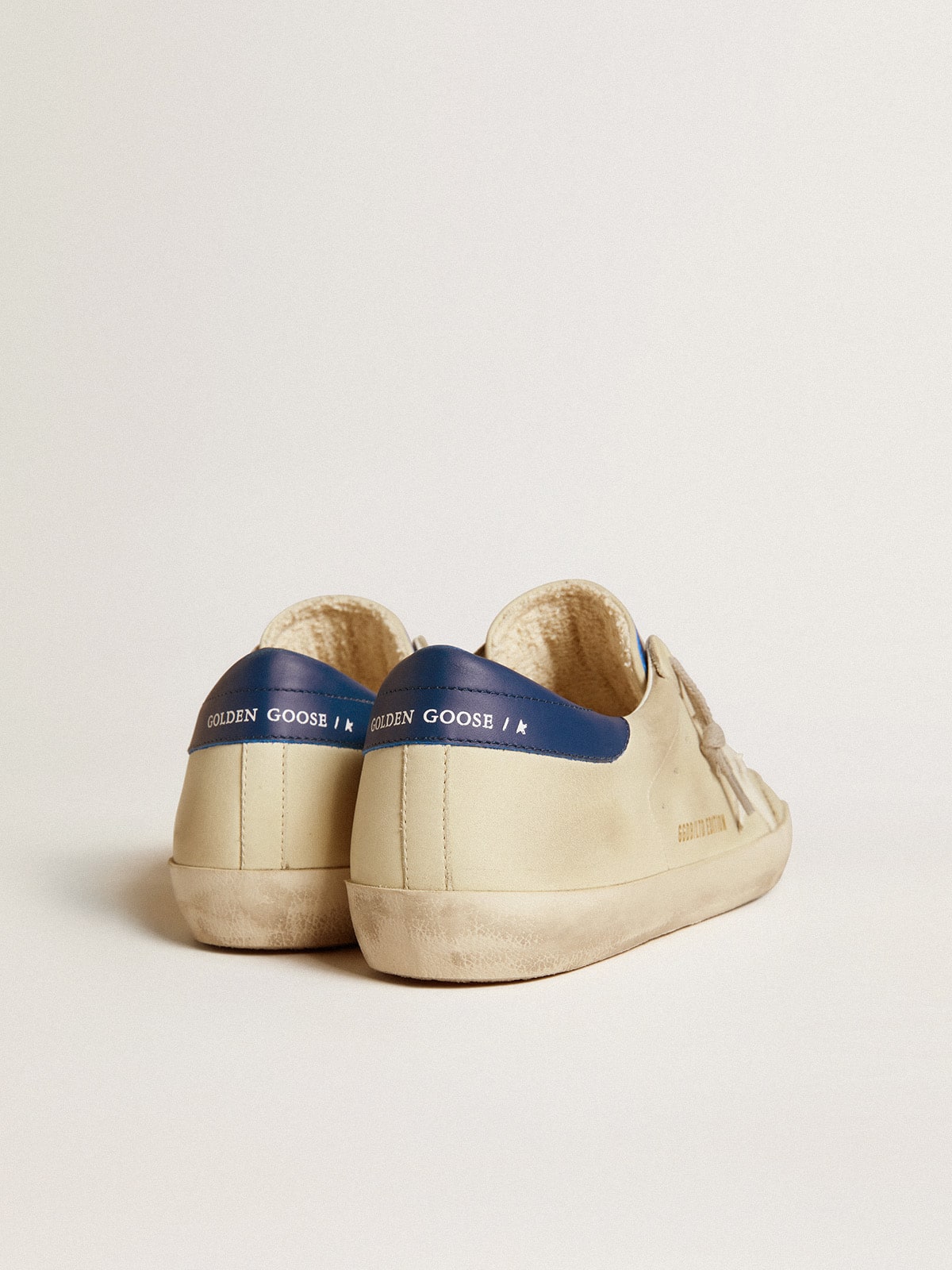 Men's Super-Star LTD in nubuck with white leather star and blue heel tab