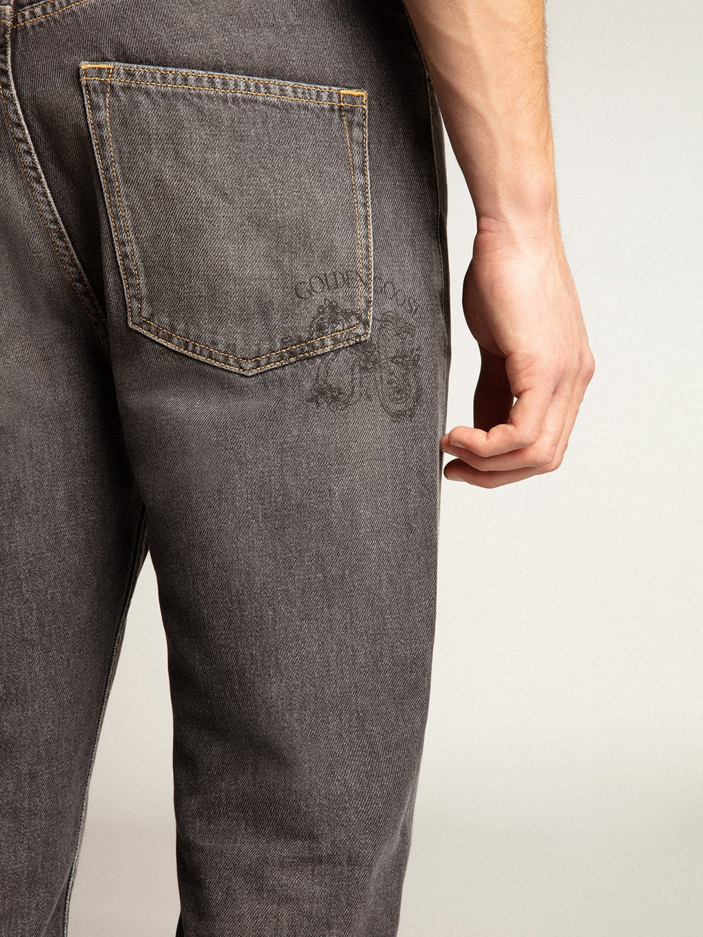 Men’s black jeans with printed pocket