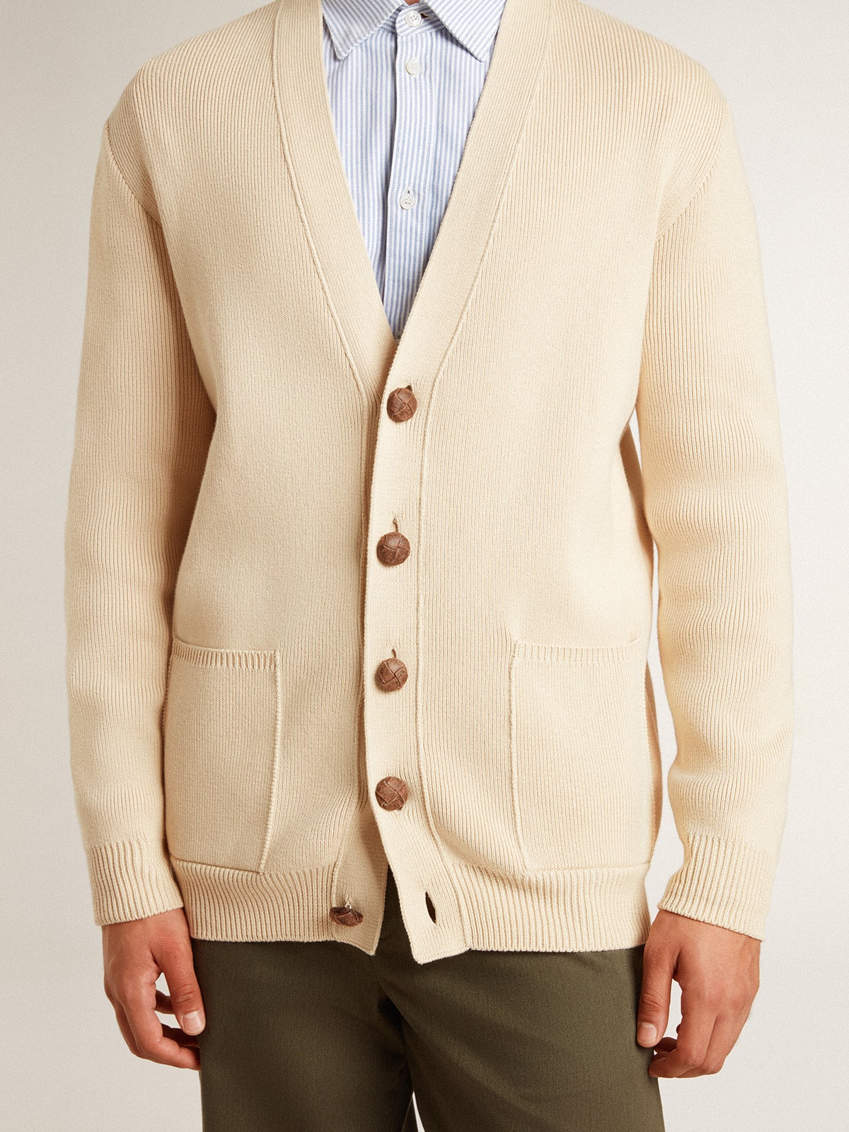 Men’s beige cardigan with 'Golden' lettering on the back