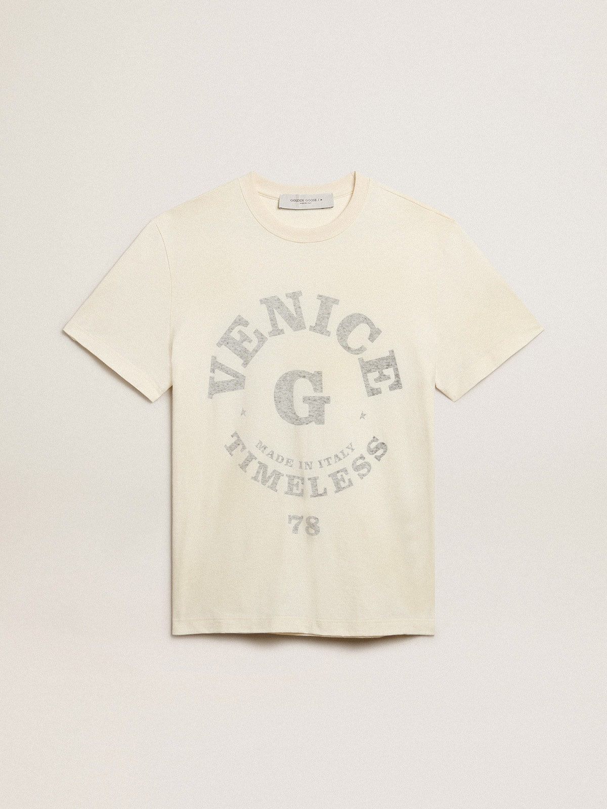 Men’s cotton T-shirt in aged white with faded lettering