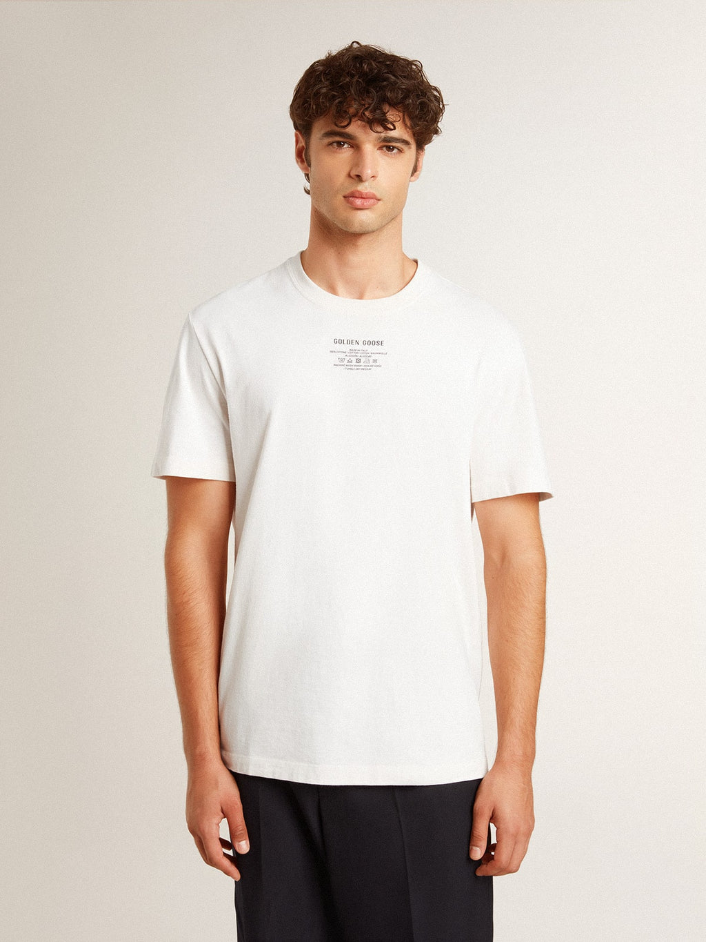 Men's worn-white cotton T-shirt with black lettering