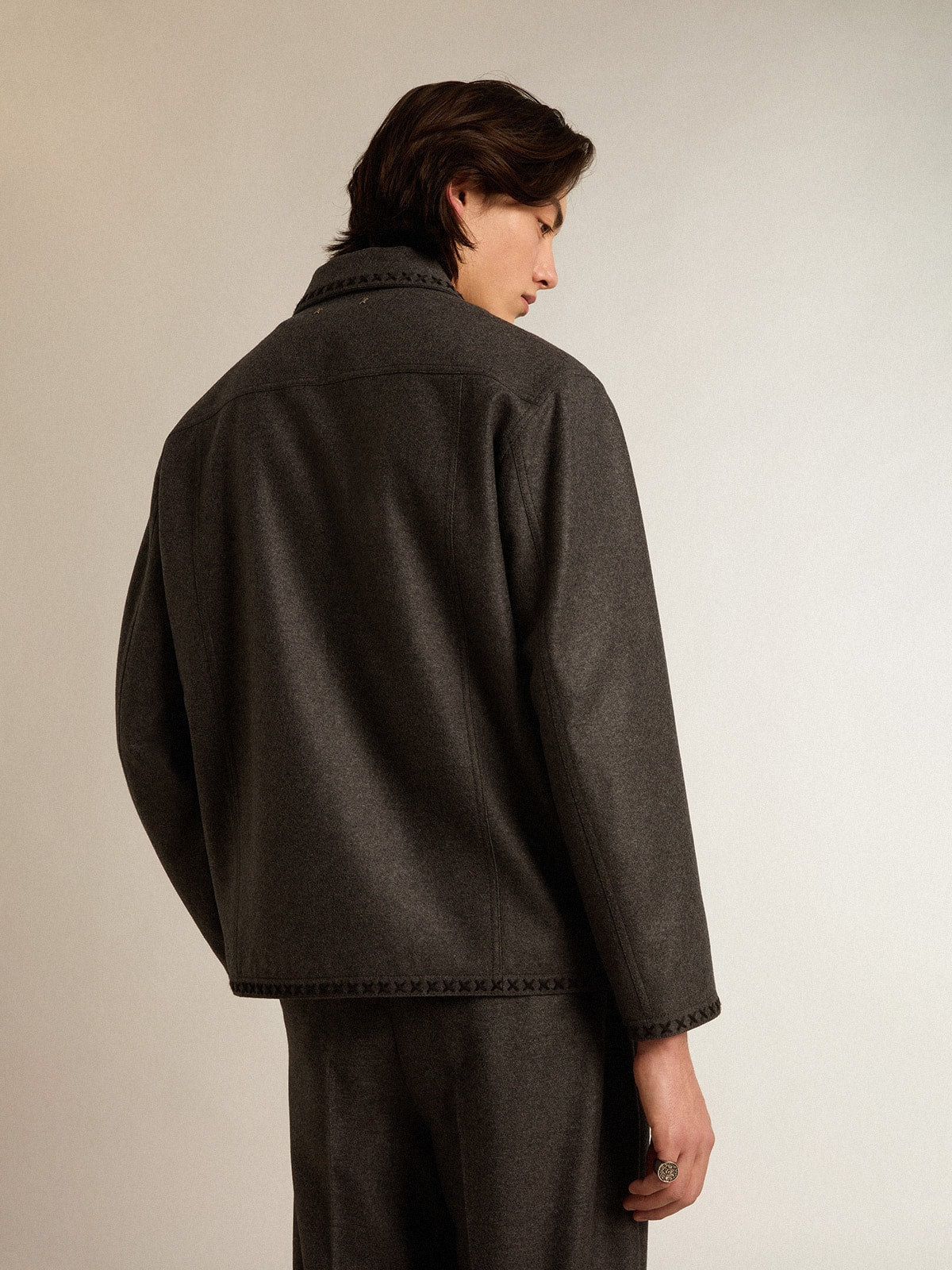 Gray melange woolen jacket with button fastening