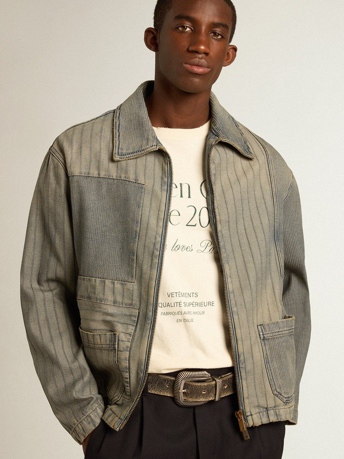 Men’s denim jacket with stripes and patches on the front