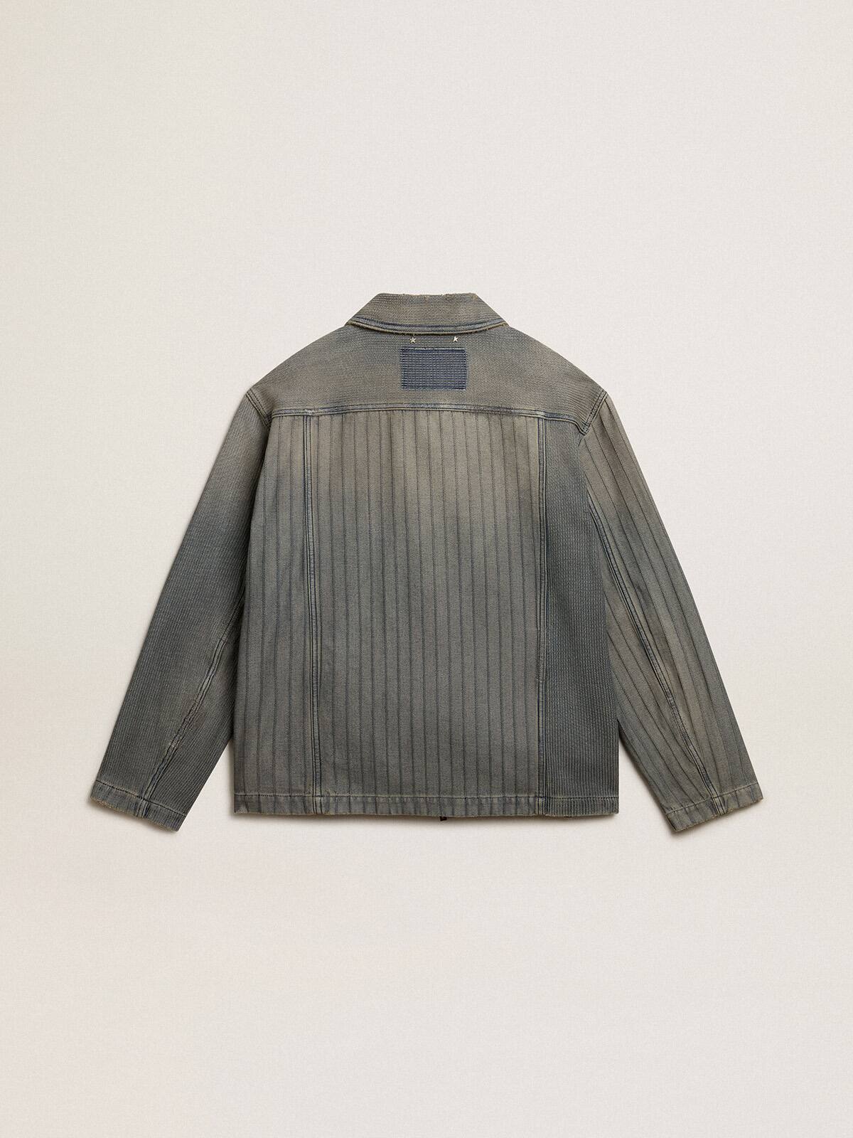 Men’s denim jacket with stripes and patches on the front