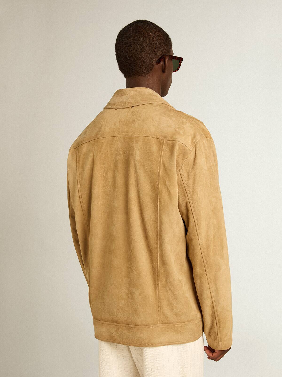 Beige-colored leather jacket with zip fastening