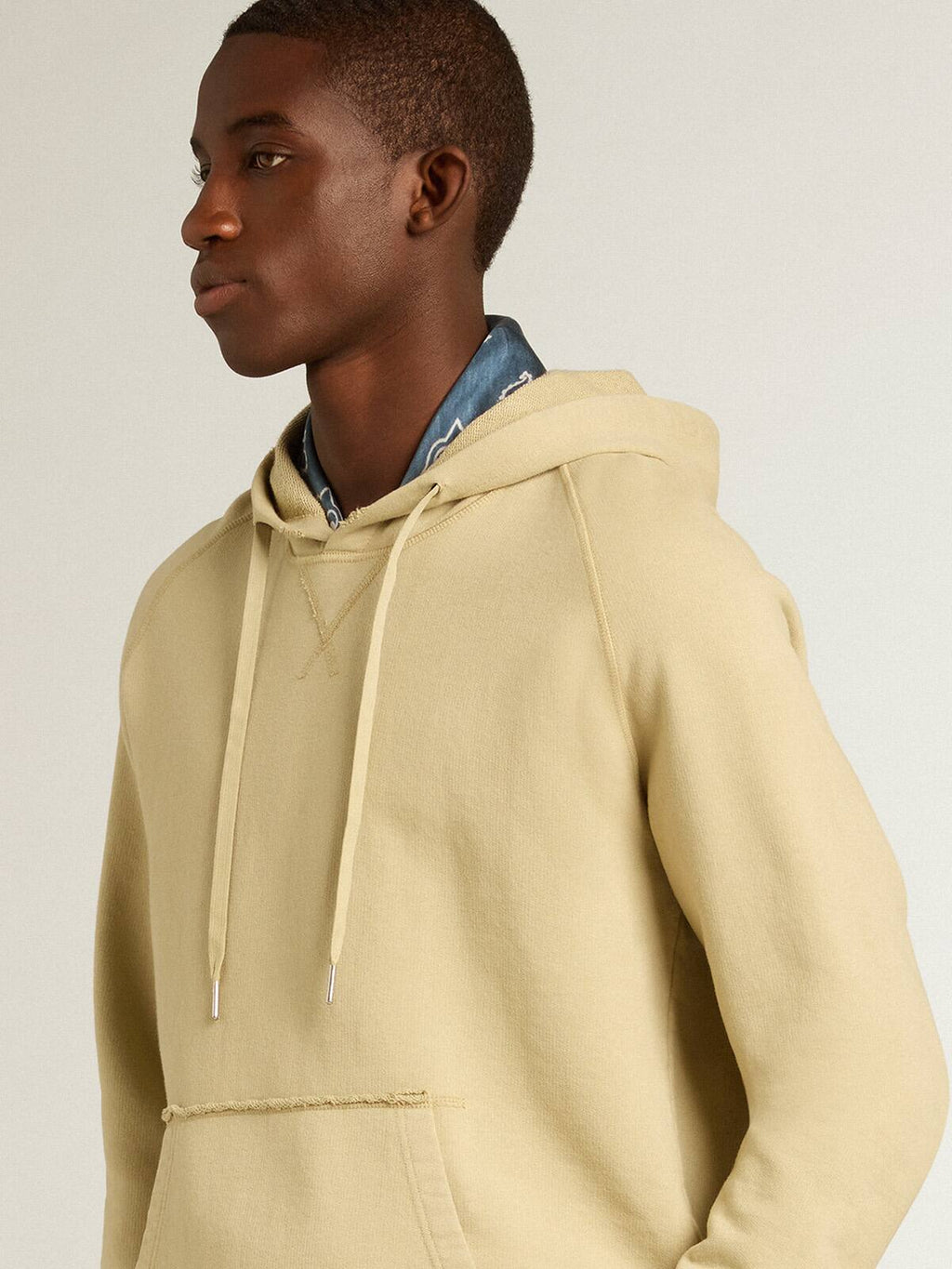 Pale eucalyptus-colored hoodie with front pocket