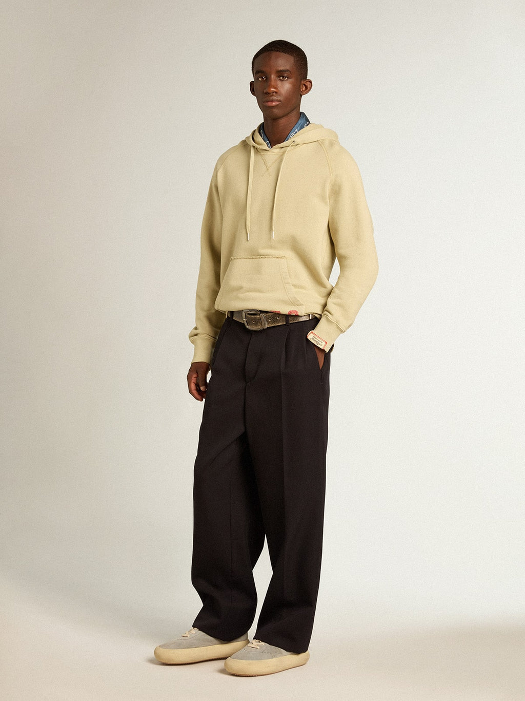 Pale eucalyptus-colored hoodie with front pocket