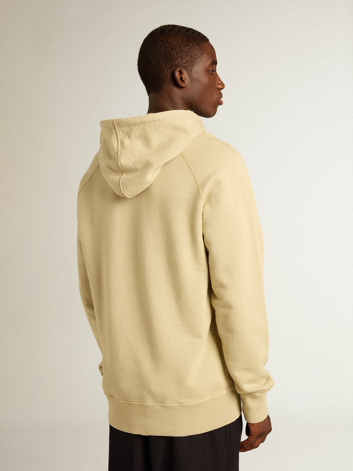 Pale eucalyptus-colored hoodie with front pocket