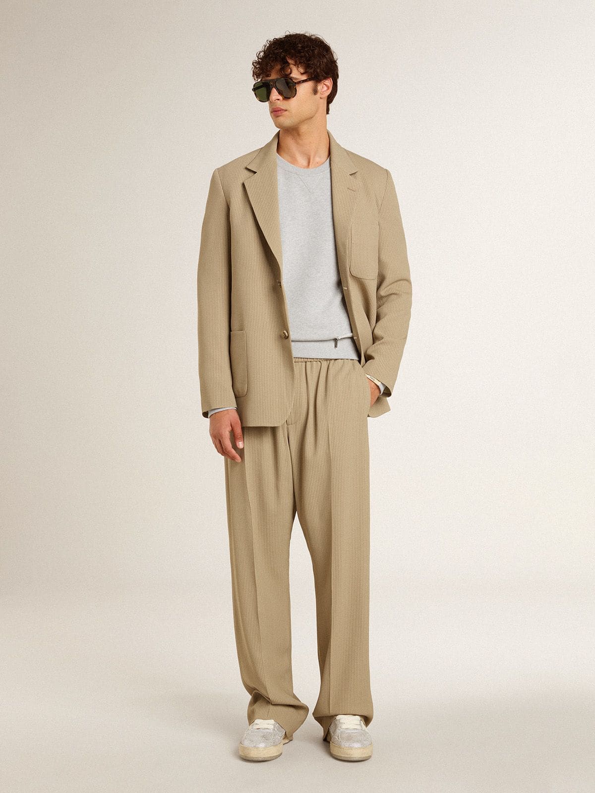 Men's beige pinstripe single-breasted jacket with an oversized fit