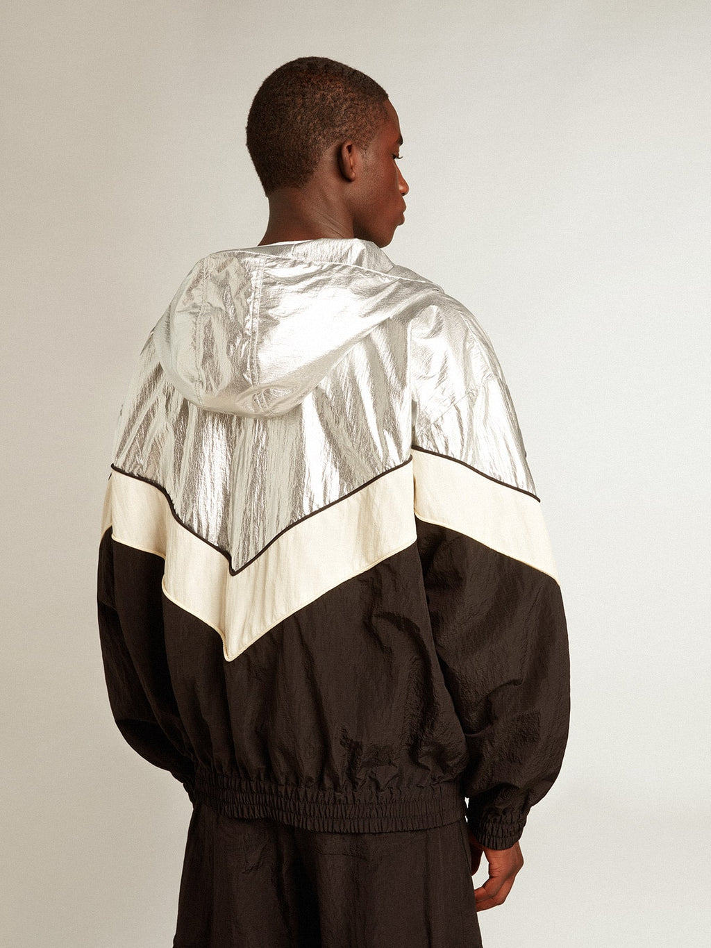 Men's windcheater in silver and black technical fabric