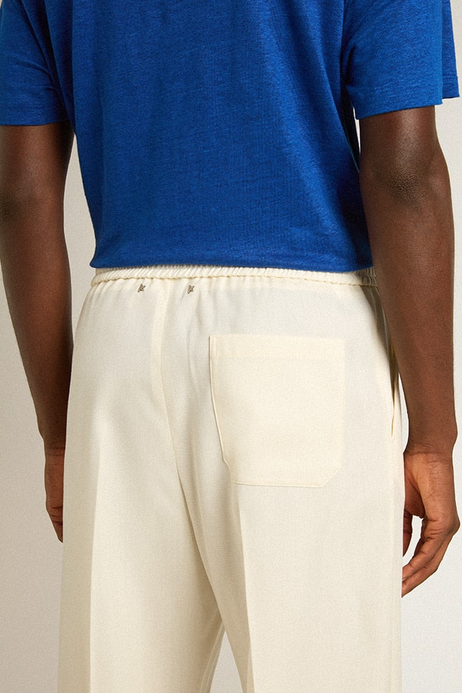 Men’s aged white wool gabardine joggers