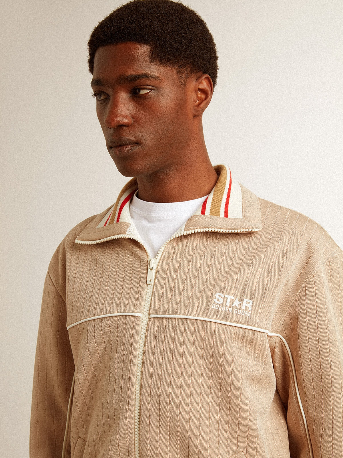 Men’s light beige zipped sweatshirt with white logo