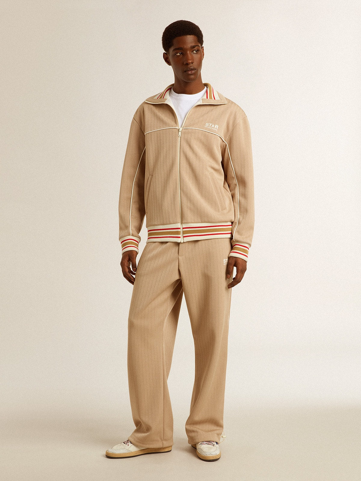 Men’s light beige joggers with white logo