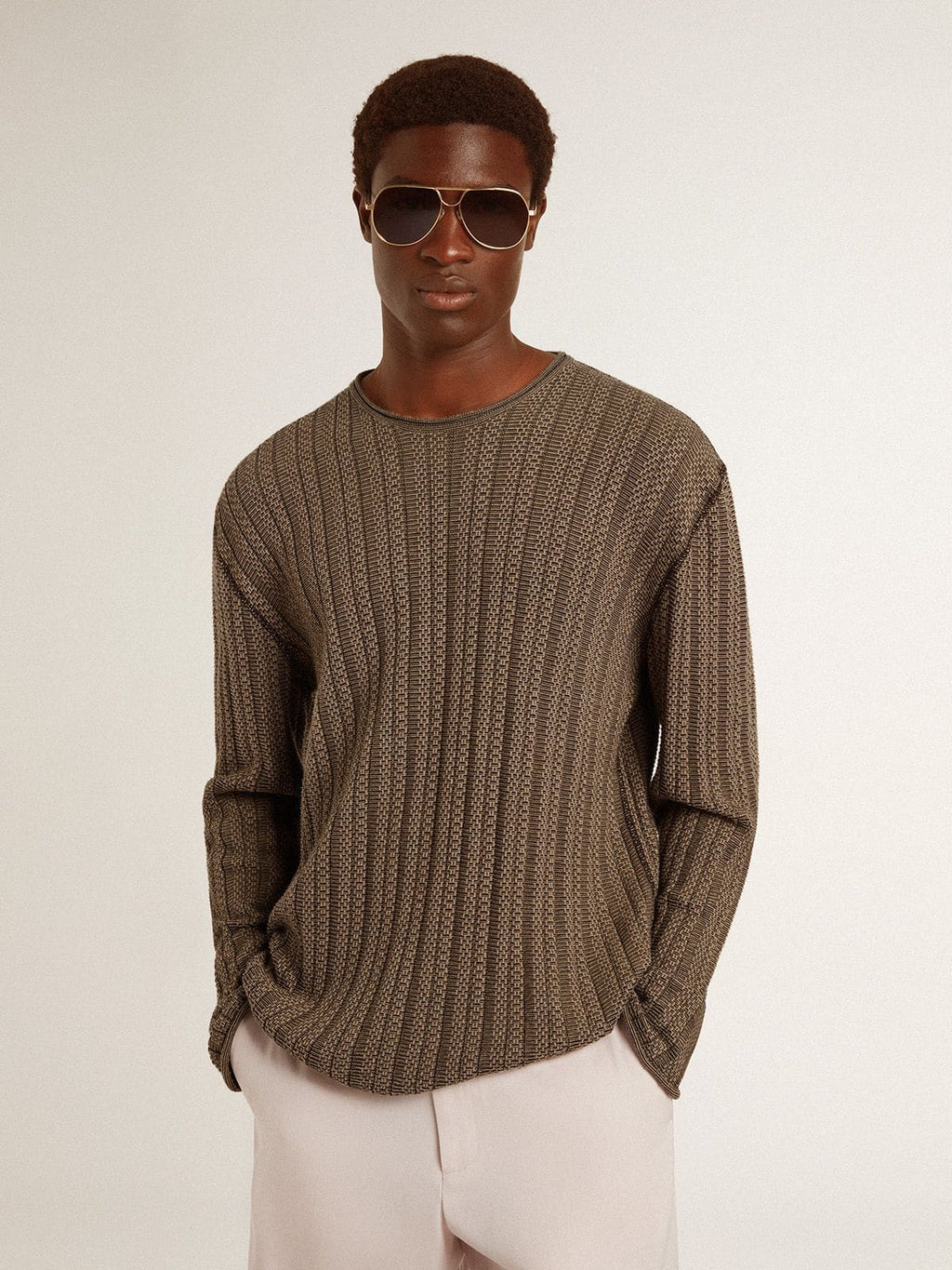 Men's travertine-colored sweater with 'Golden' patch lettering on the back