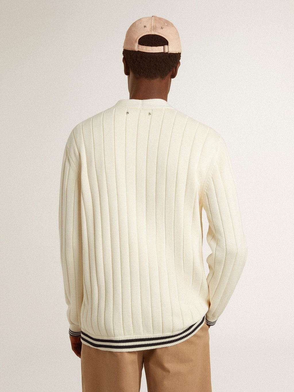 Men's white cotton cardigan with a cable pattern and blue ribbing