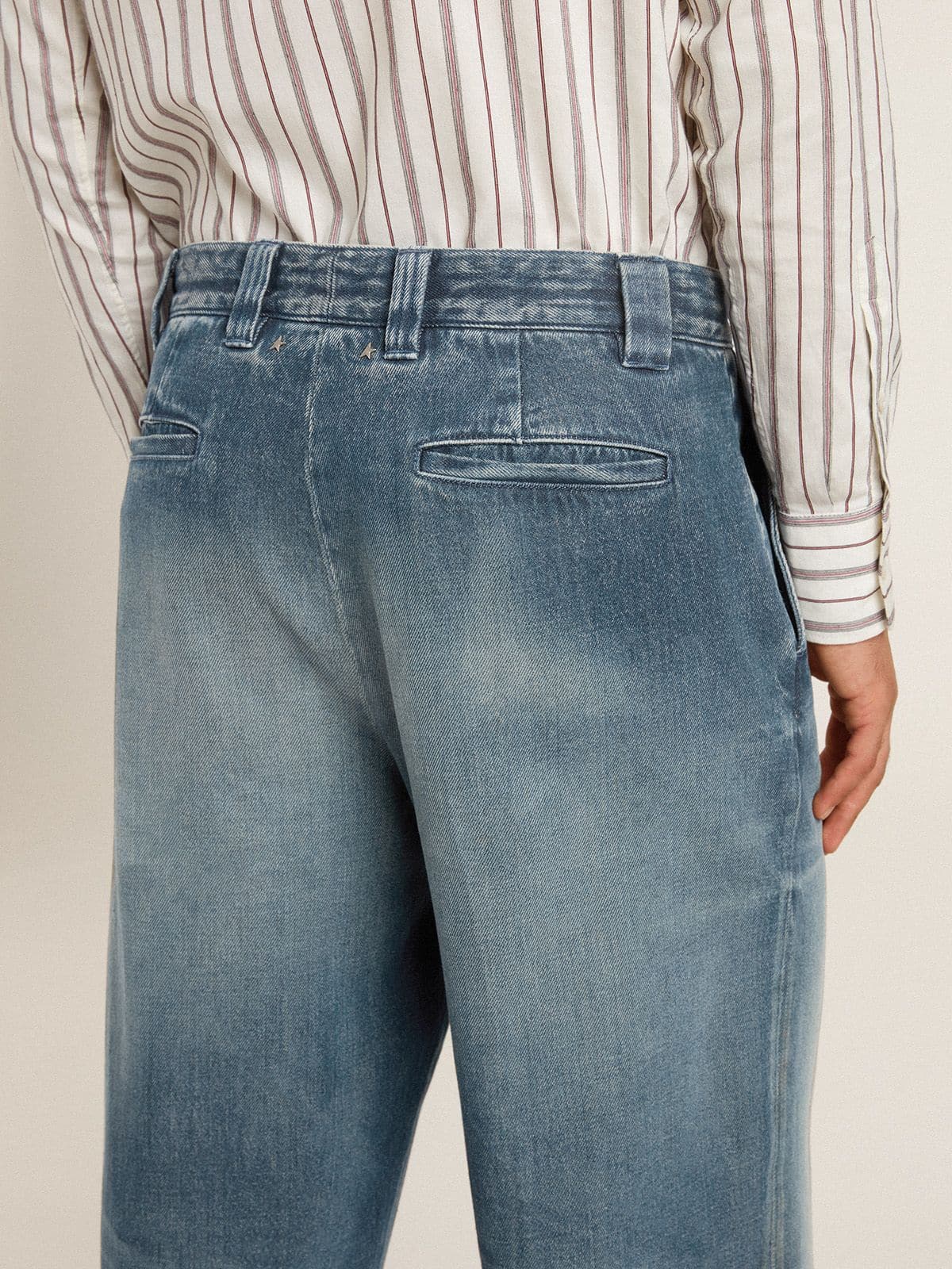 Men's denim chinos with distressed details