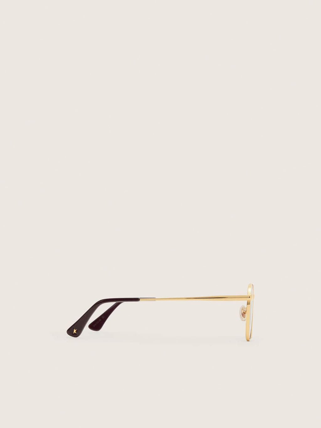 Aviator style sunglasses with gold frame and green lenses