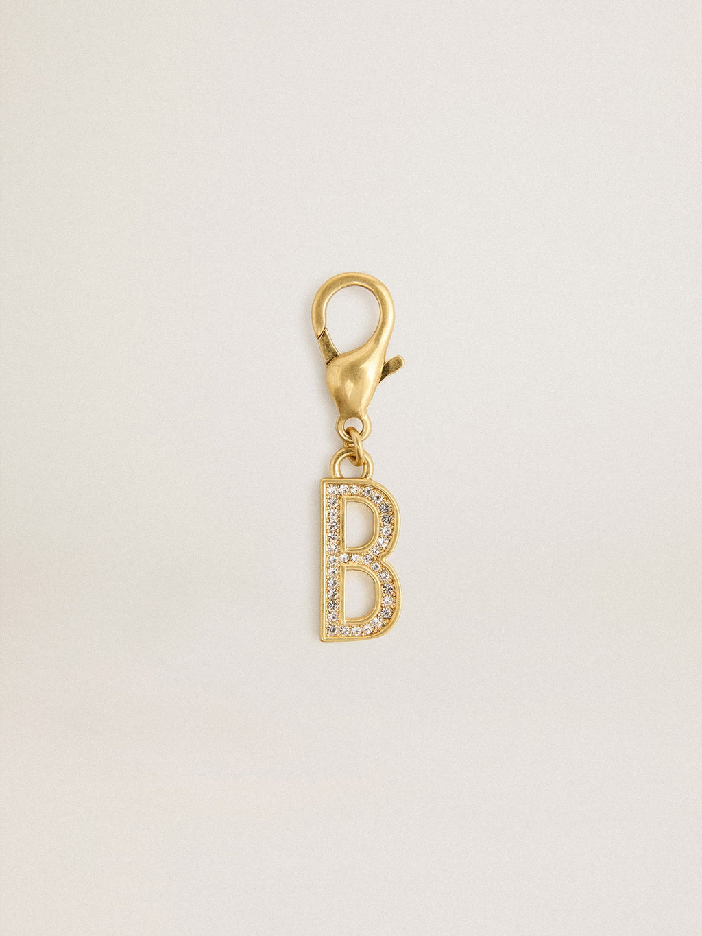 Letter B charm in gold-colored brass with crystals