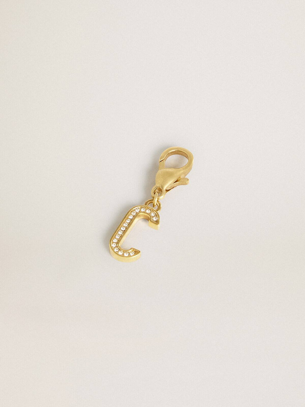 Letter C charm in gold-colored brass with crystals