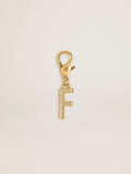 Letter F charm in gold-colored brass with crystals