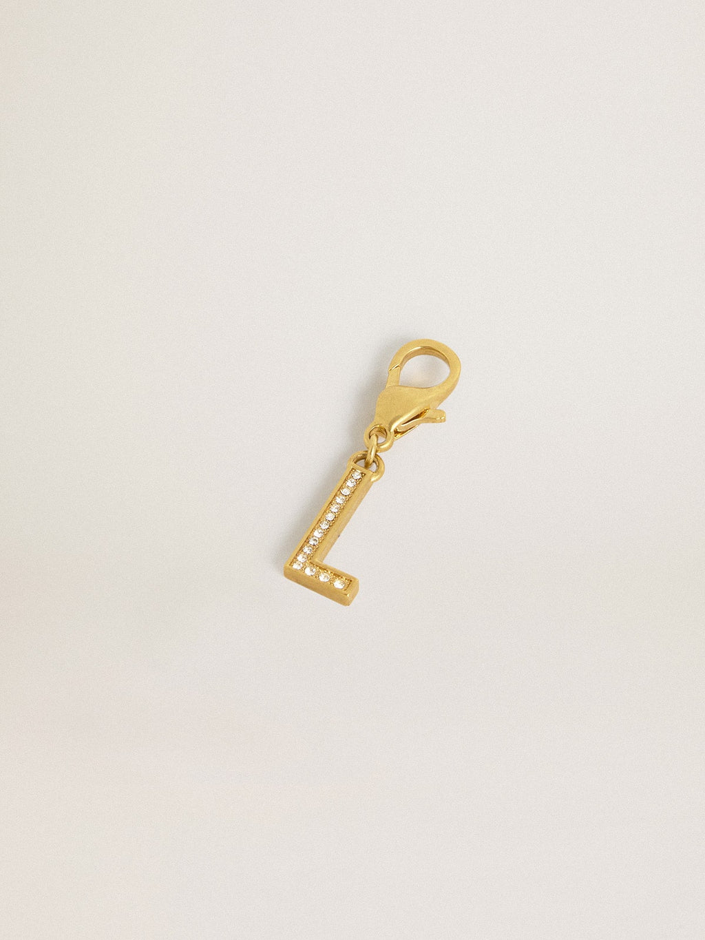 Letter L charm in gold-colored brass with crystals