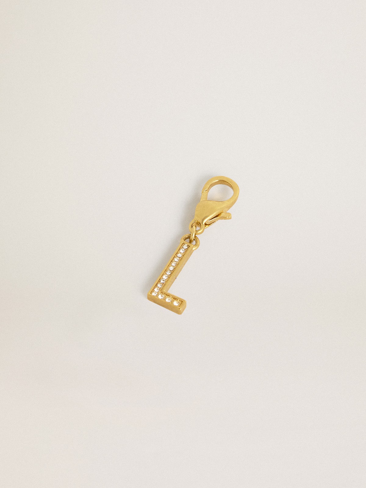 Letter L charm in gold-colored brass with crystals