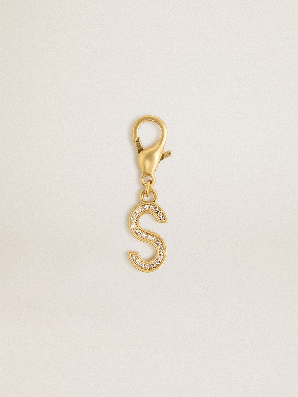 Letter S charm in gold-colored brass with crystals