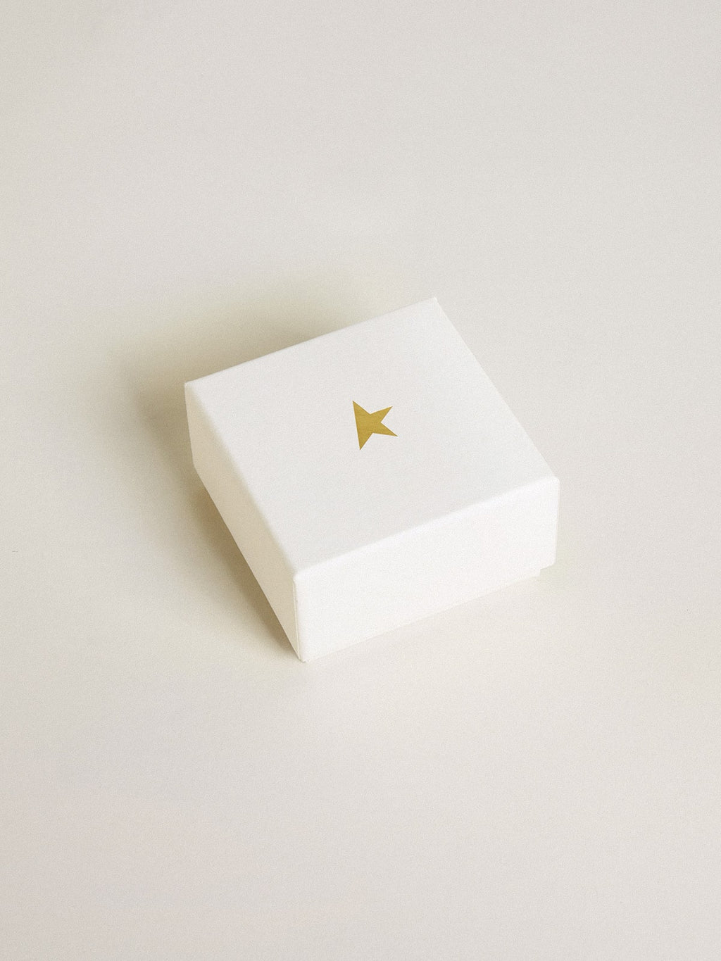 Letter V charm in gold-colored brass with crystals