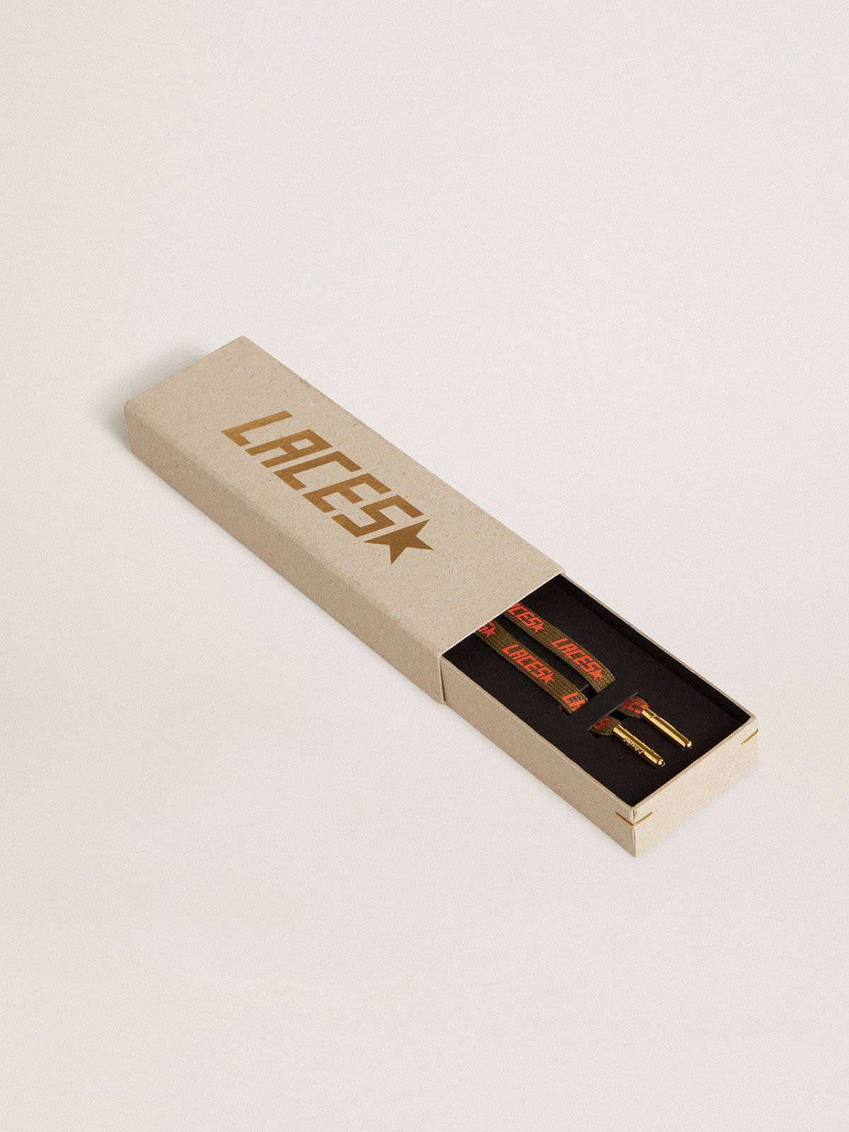 Military-green laces with contrasting orange ‘Laces’ lettering