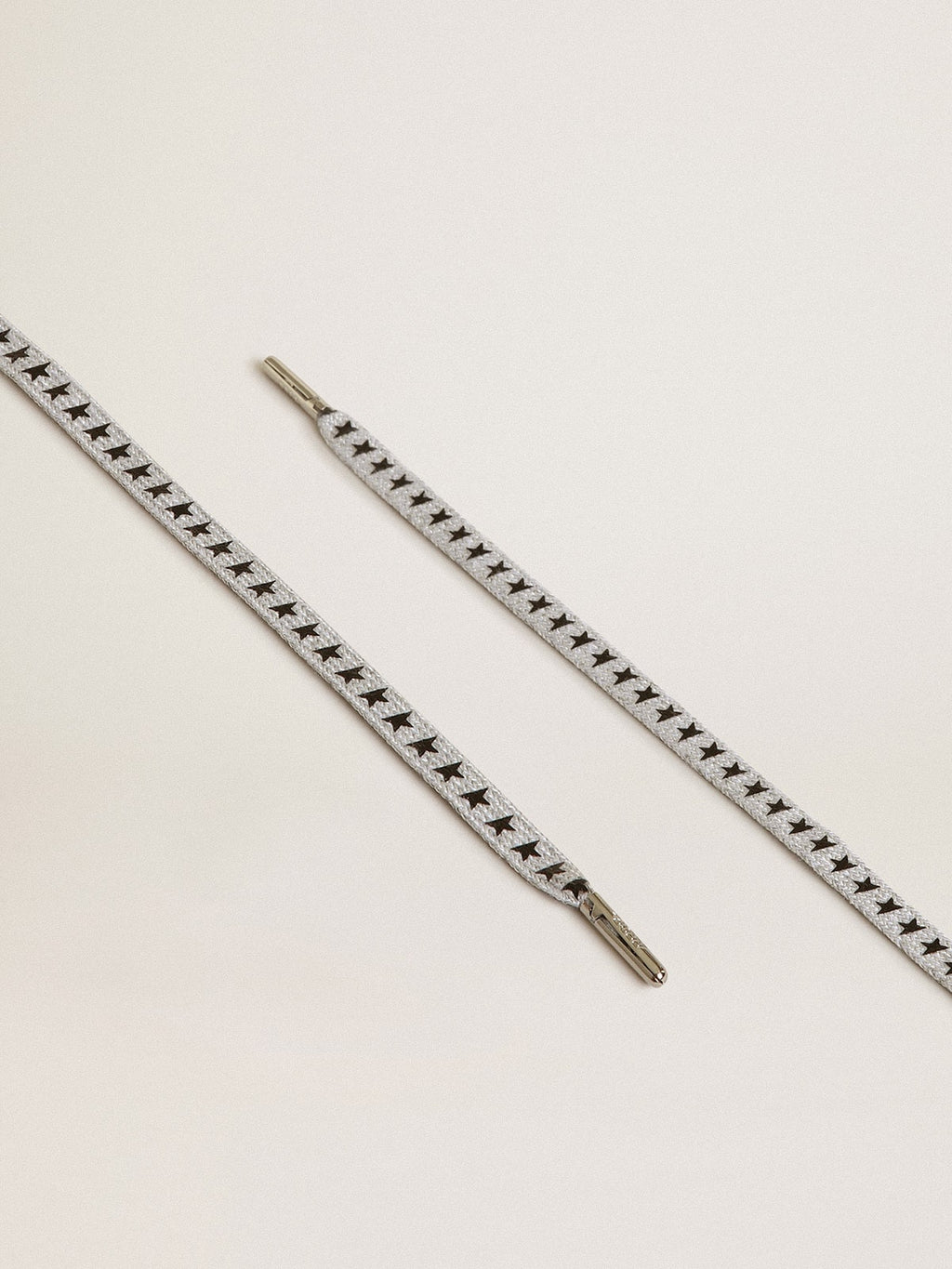 Ice-gray cotton laces with contrasting black stars