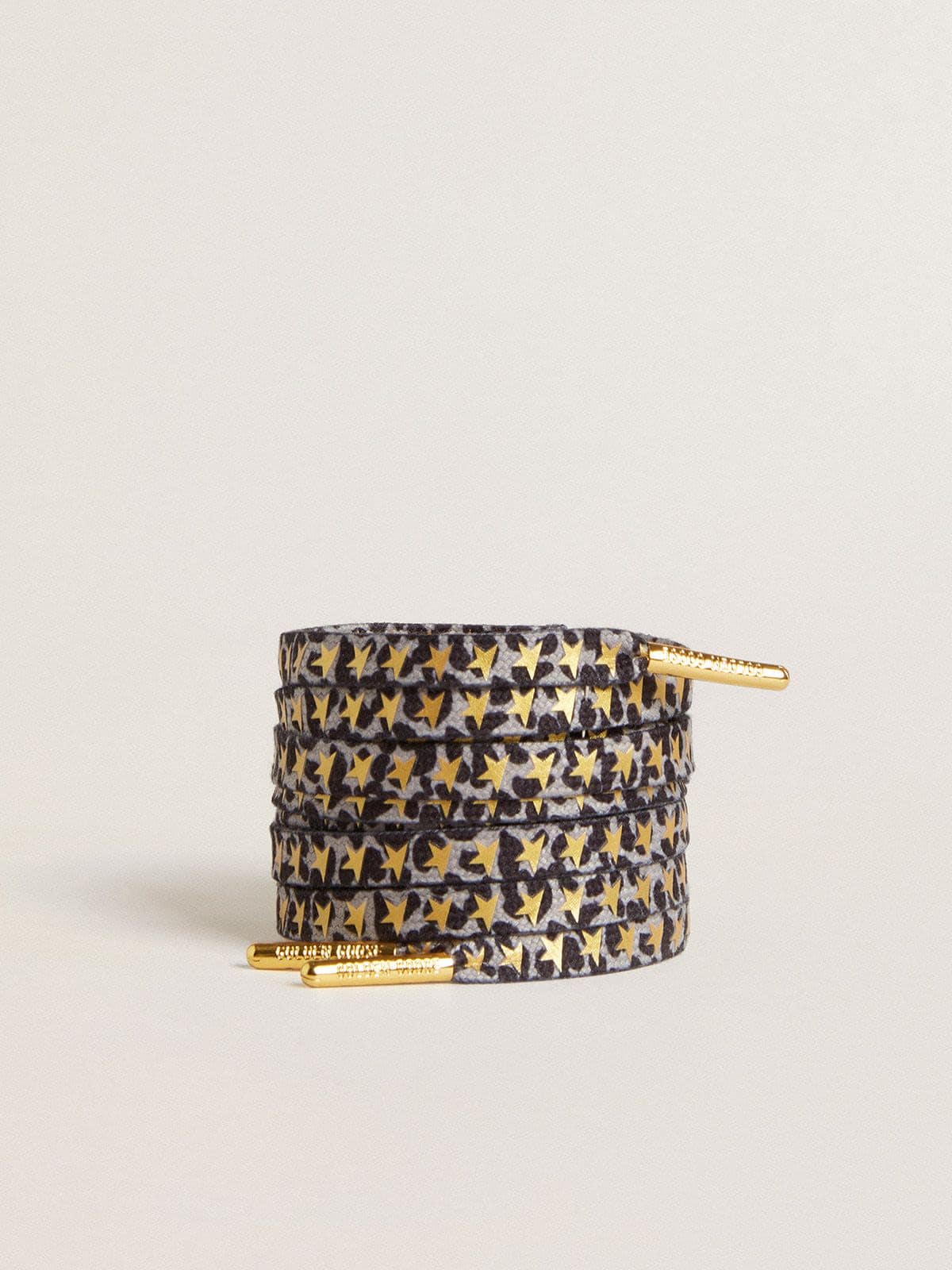Laces with gray and black animal print with contrasting gold stars