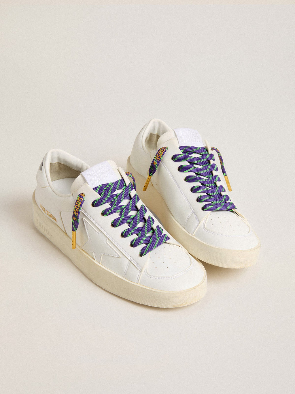 Neon green and purple cotton laces with contrast gold lettering